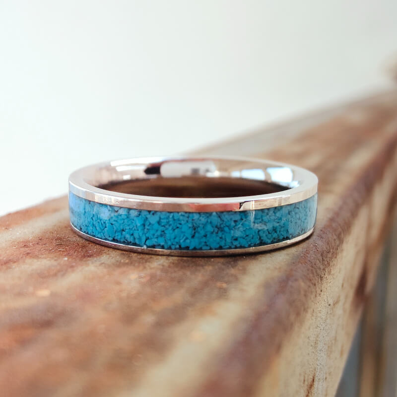 4mm Steel Turquoise Minimalism Band Ring on rustic surface