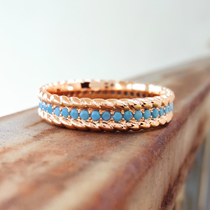 Rose gold twisted band ring with turquoise stones