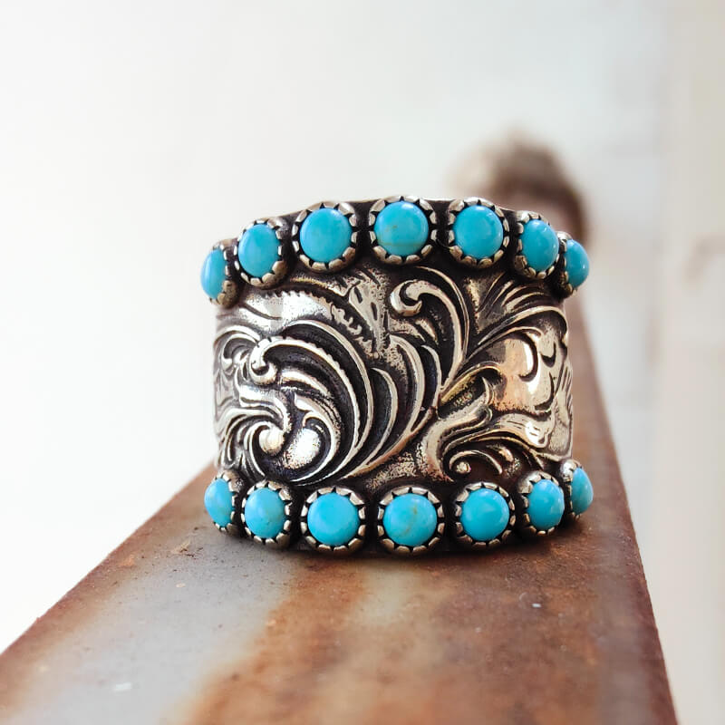Western engraved silver ring with turquoise stones