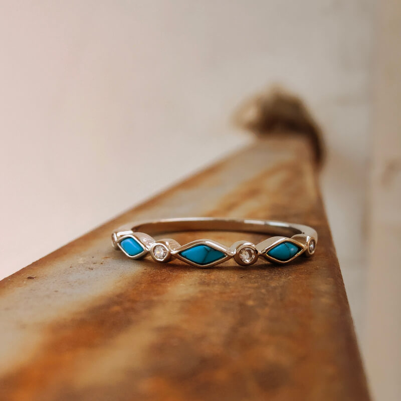 Sterling silver turquoise band ring with diamond accents