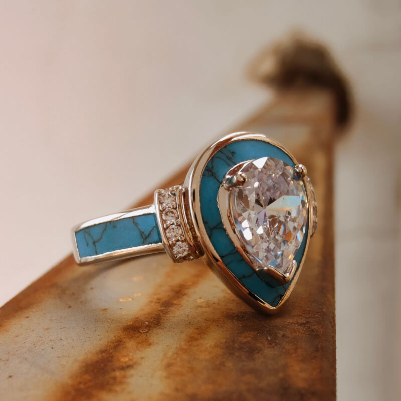 Pear turquoise inlay engagement ring with diamond accents