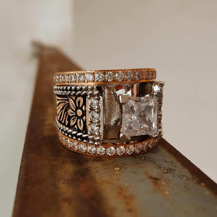 Rose gold flower square diamond ring with silver accents and detailed engravings.