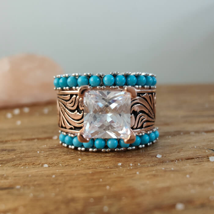 Sterling silver ring with turquoise beads and square diamond center
