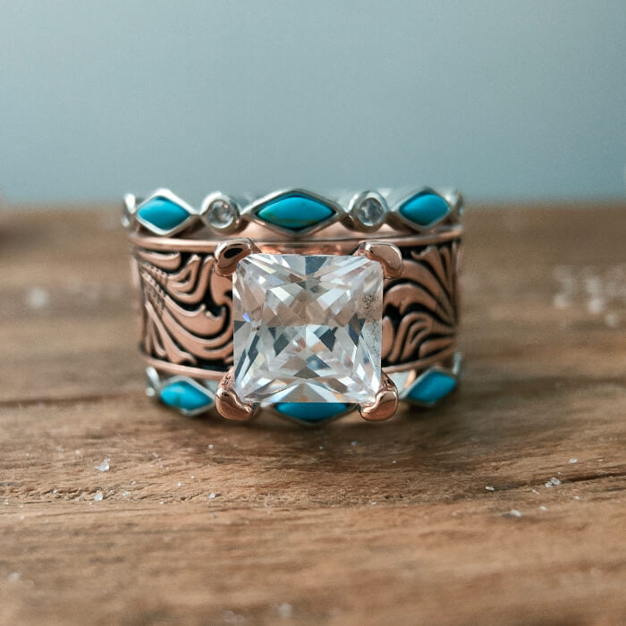 Sterling silver engagement ring with square diamond and turquoise accents