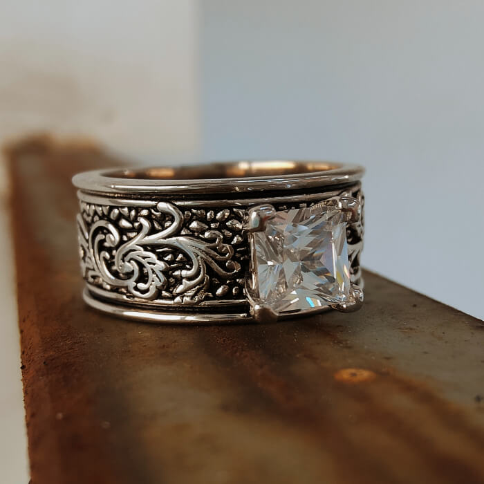 Silver flower carved band ring with square diamond accent
