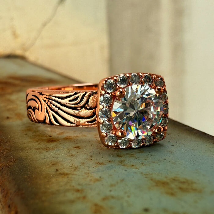 Rose gold engraved band engagement ring with zircon stone and diamond accents