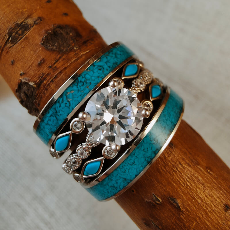 5pc sterling silver wedding ring set with round moissanite and turquoise accents.
