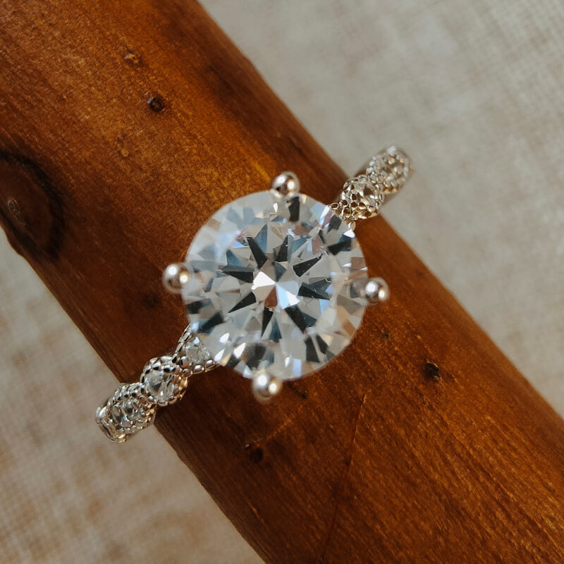 Sterling silver round cut moissanite engagement ring
