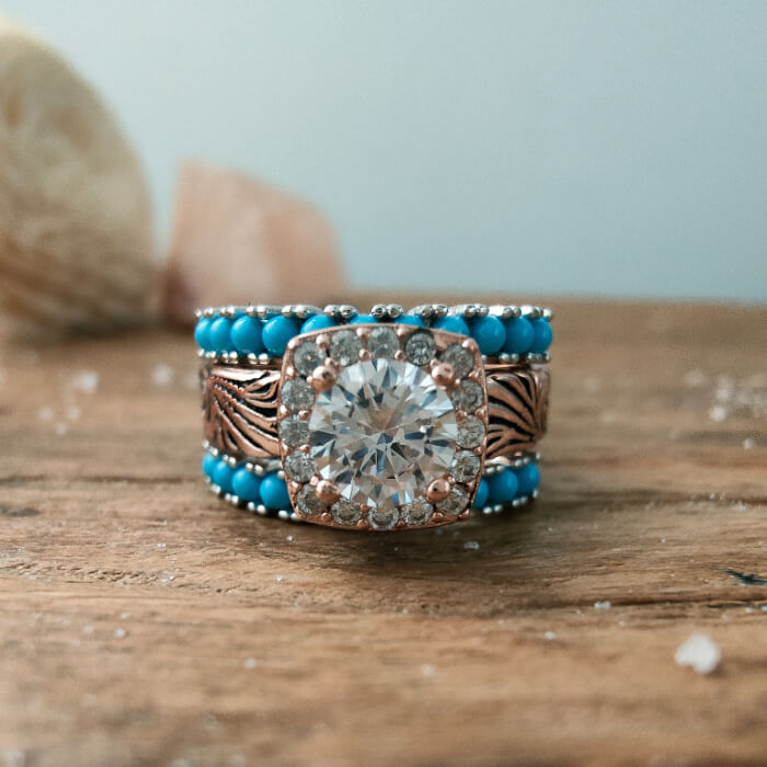 Rose gold wedding ring with turquoise beads and moissanite center stone