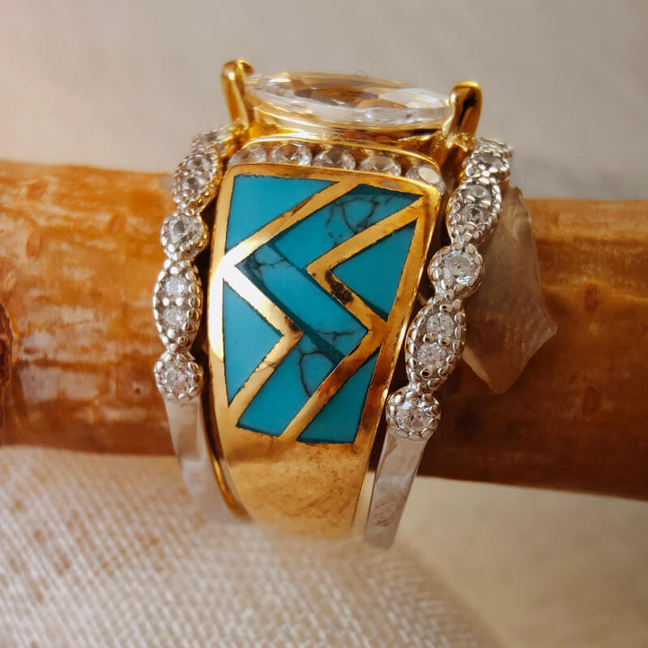 Gold turquoise and diamond ring with wave design and intricate details
