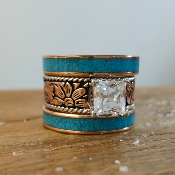 Rose gold wedding ring with princess cut diamond and turquoise floral band