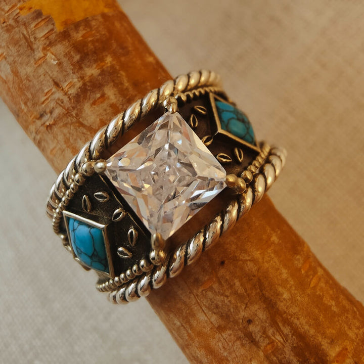 Square diamond-like stone ring with turquoise accents in sterling silver