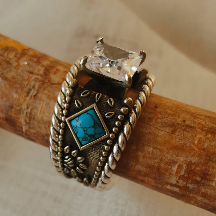 Sterling silver ring with turquoise and diamond-like stone