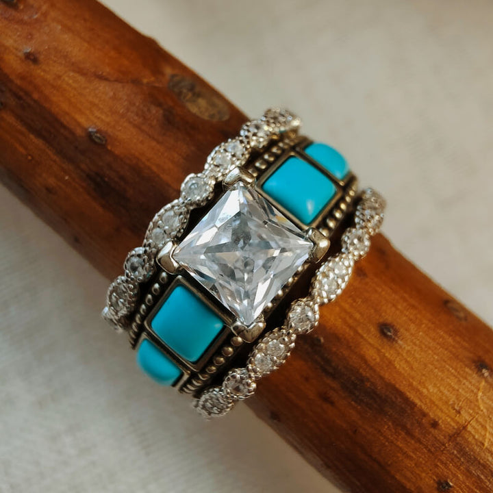 Square zircon and turquoise stacked ring set with diamond details.