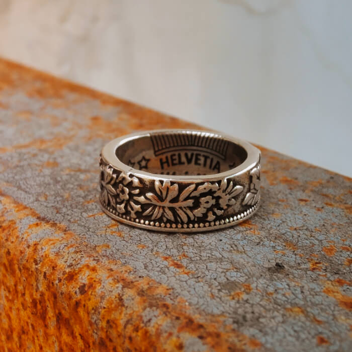 6mm steel Western band ring with intricate floral designs, showcasing leaf engravings.