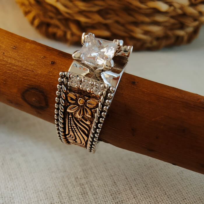 Rose gold and silver floral wide band ring with square zircon gemstone.