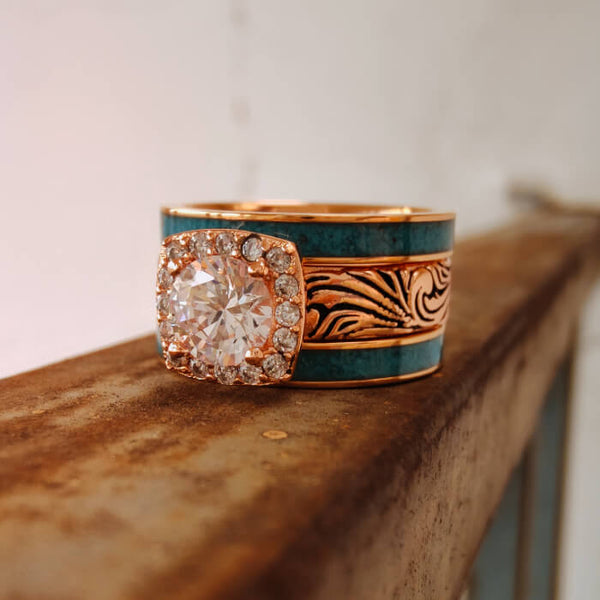 Rose gold Western engagement ring with moissanite stone and turquoise band