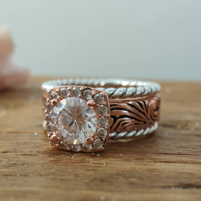 Moissanite rose gold promise ring with floral design and diamond accents