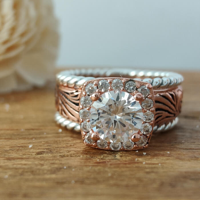 Rose gold Western promise ring with round Moissanite center stone and diamond accents