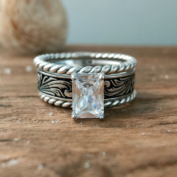 Silver twist band ring with rectangular zircon stone and engraved design