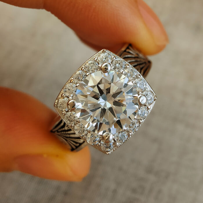 7mm Western engagement ring with cubic zirconia and intricate silver band design.