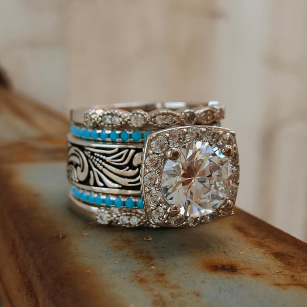 Vintage turquoise and diamond engagement ring set with floral engravings