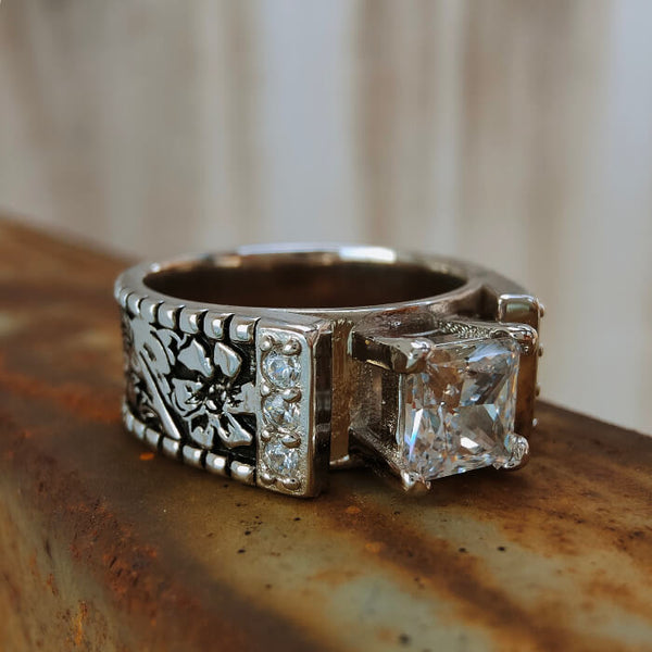 Western-style silver ring with square zircon and diamond accents