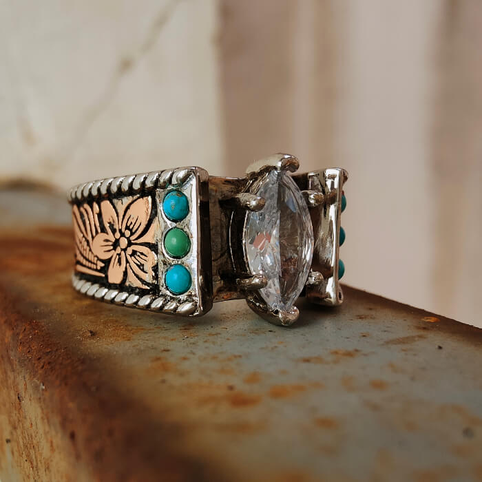 Rose gold band ring with zircon gem and turquoise accents, floral engraving design