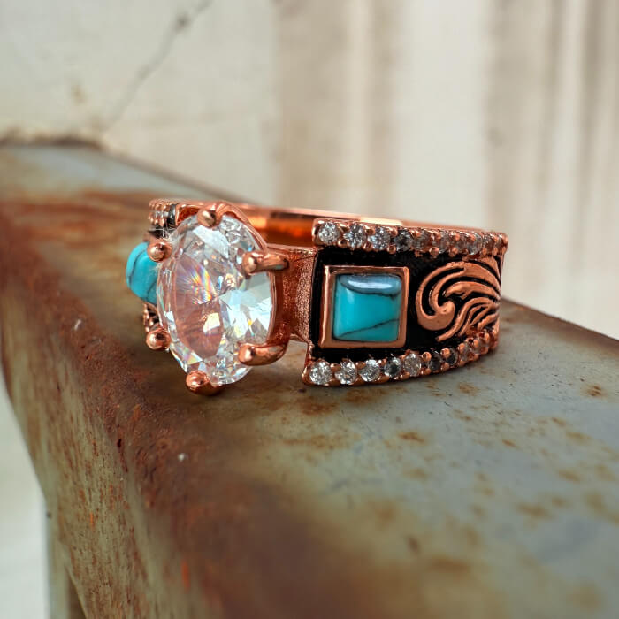 Wide band rose gold engagement ring with oval zircon and turquoise accents