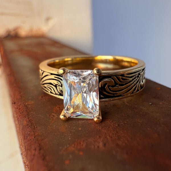 14K gold engagement ring with rectangular zircon and ornate engraved band