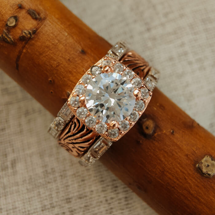 Vintage Western promise ring set with round Moissanite, rose gold and silver bands.
