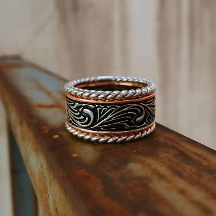 3pc engraved Western band ring featuring silver and copper accents.