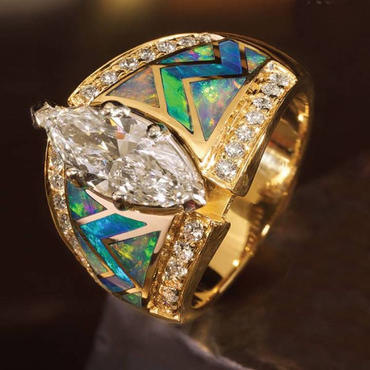 Gold marquise diamond ring with blue opal inlays and zircon details