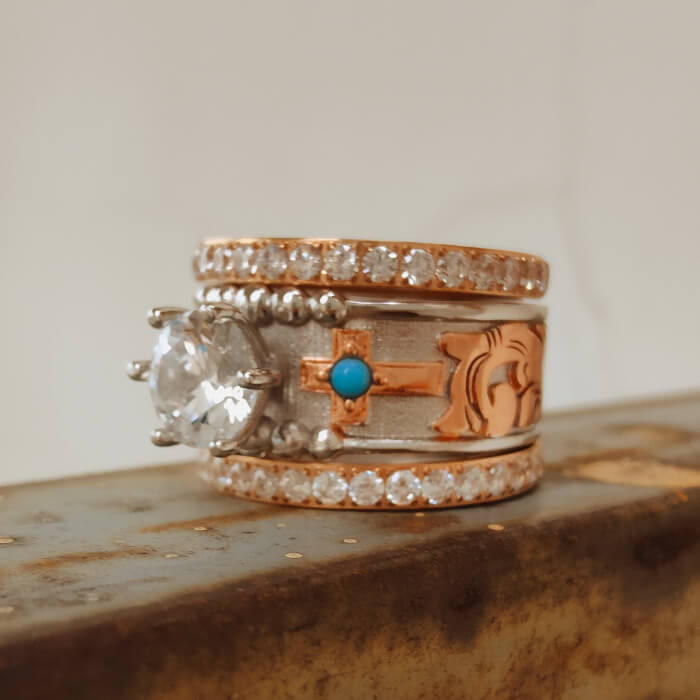 3-piece rose gold promise ring set featuring turquoise and clear diamond accents