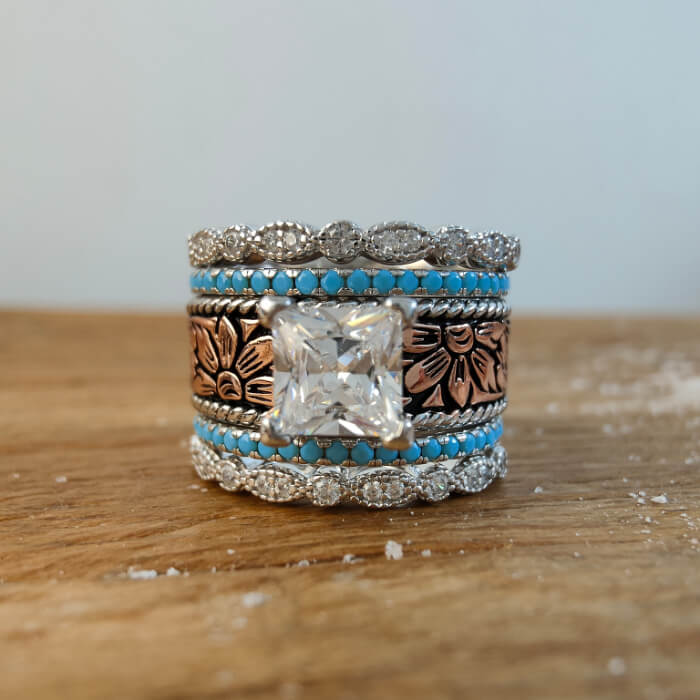 Rose gold and silver stacked turquoise engagement ring with floral details