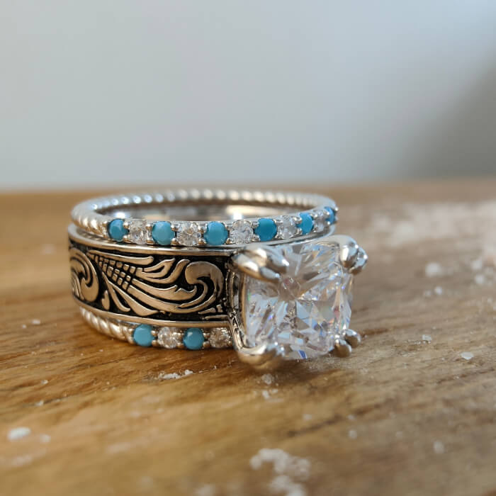 Turquoise and diamond wedding ring set with floral engravings and blue accents