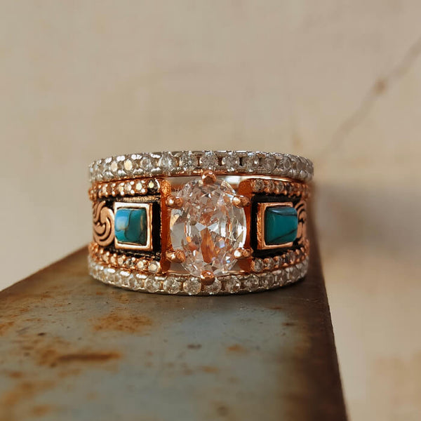 Rose gold wide band engagement ring with oval cut turquoise and diamond accents