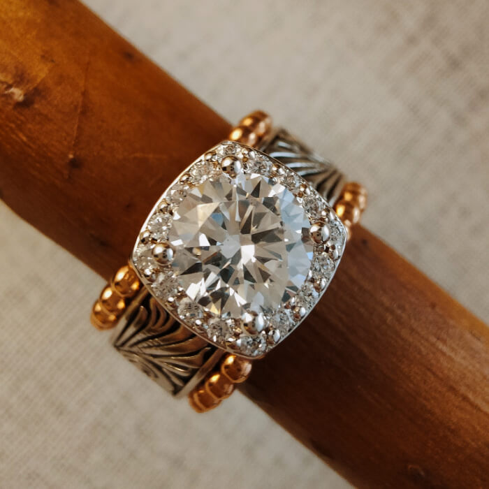 Western wedding ring set with round diamond and gold accents