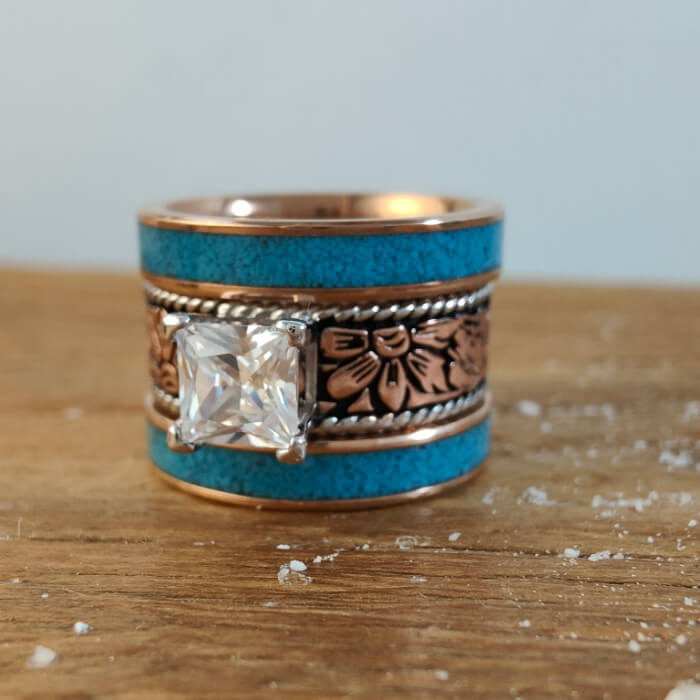 Rose gold floral turquoise band ring with princess cut center stone