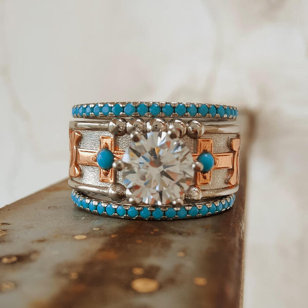 3pc rose gold turquoise engagement ring with round cut gemstone and intricate design