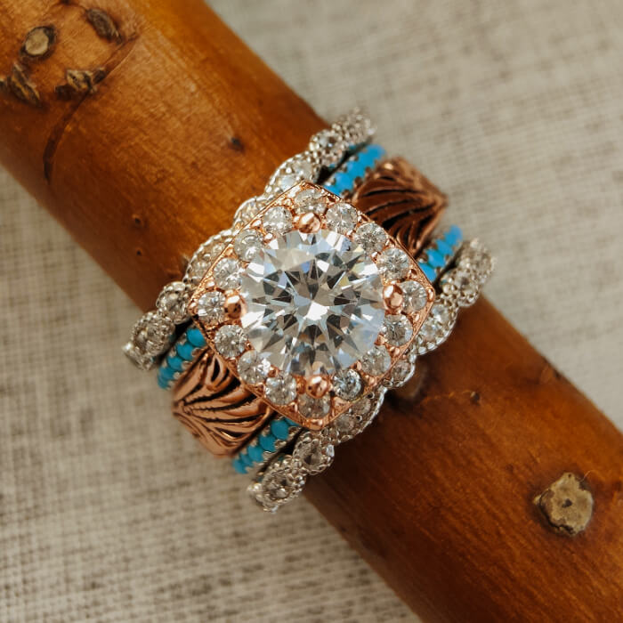 Vintage inspired turquoise ring with moissanite center and intricate silver accents