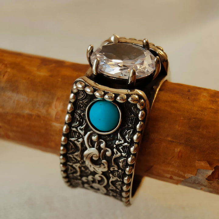 Handcrafted turquoise diamond engagement ring with intricate engravings