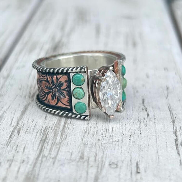 Flower engraved turquoise ring with zircon gem and silver band