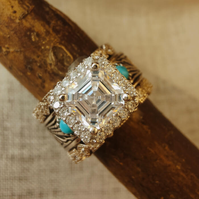 Silver vintage ring showcasing radiant diamond and turquoise gemstones