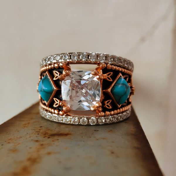 Rose gold Western engagement ring with turquoise and diamond accents