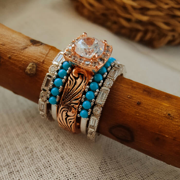 Rose gold vintage wedding rings set with turquoise and moissanite accents