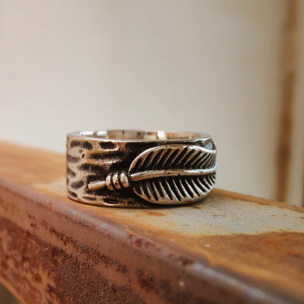 Feather steel Western band ring for men with textured design