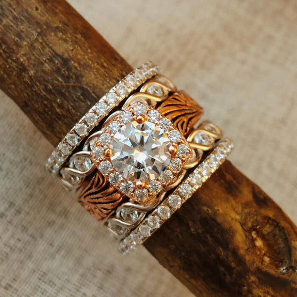 Rose gold wedding ring set with zircon center and engraved bands