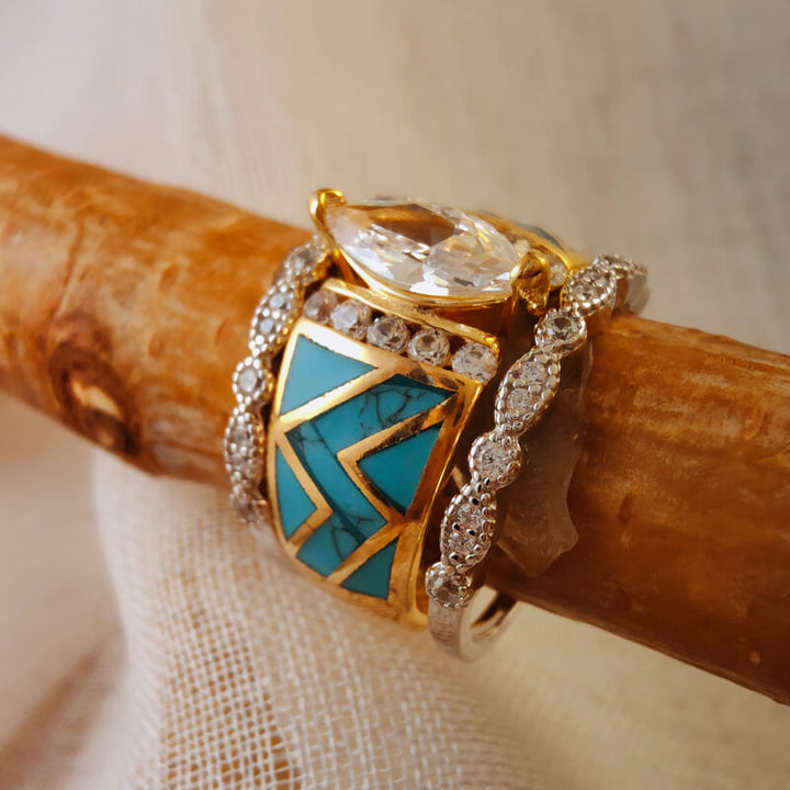 Stylish three-piece gold and turquoise ring with diamond accents