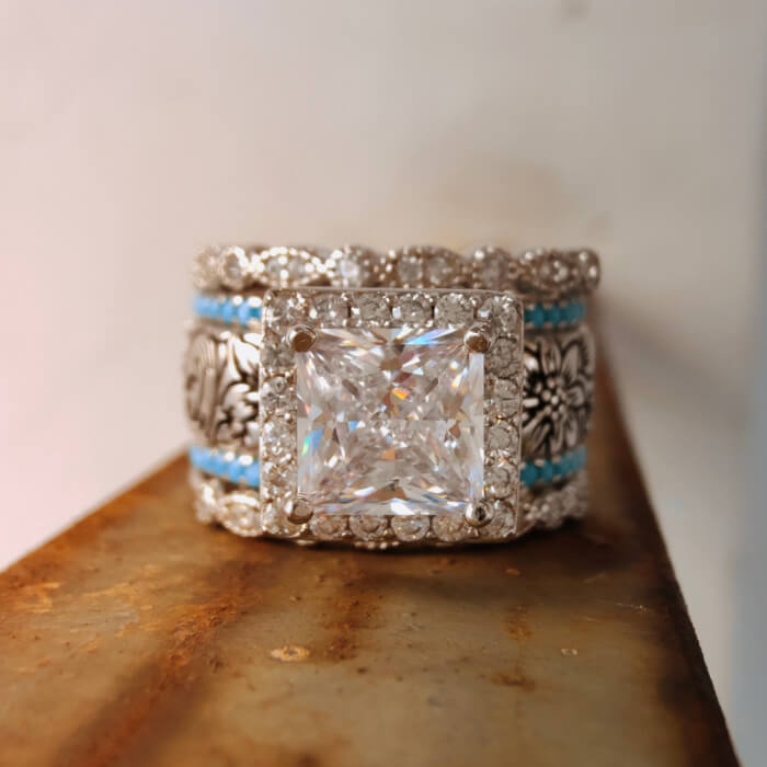 Princess cut Western engagement ring with turquoise accents and floral engravings